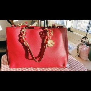 Red Michael Kors bag